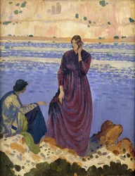 Zwei Frauen auf Felsen am Meer