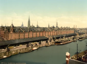 Lagerhäuser an den Docks, Hamburg, Deutschland, Photochromdruck, ca. 1900