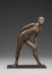 Tänzerin, die ihr Knie reibt, bekannt als Tänzerin in der Rolle des Harlekin (Bronze)