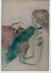 Im Theater: Frau mit einem Fächer