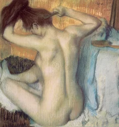 Frau kämmt ihr Haar, ca. 1885