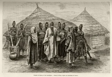 Frauen von Samory Touré (um 1835-1898), Kriegsherr der Nigerschleife, und ihr Aufseher, ein Soninke, der Arabisch lesen und schreiben kann, wie das Papier in seiner Hand belegt. Stich von Riou zur Illustration der Erzählung „Vom Niger zum Golf“