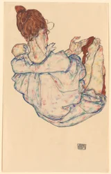 Sitzende Frau, Rückenansicht