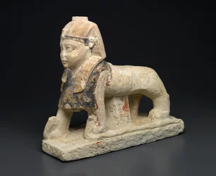 Der Gott Tutu als Sphinx, die auf Schlangen tritt