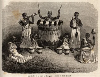 Das Hoforchester, in Karague (westlich des Viktoriasees, heutiges Simbabwe), Zeichnung von Emile Bayard (1837-1891), zur Illustration von Captain Spekes Entdeckungsreise in Afrika von 1860 bis 1863. Gravur in „Le tour du monde“, herausgegeben von Edouard C