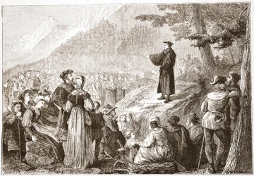 Ein Schweizer Reformator predigt seiner Herde im Freien, Illustration aus Die Geschichte des Protestantismus von James Aitken Wylie, veröffentlicht 1878