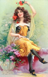 Eine sitzende junge Frau mit Blumen im Haar