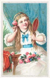 Ein junges Mädchen mit einer Blume im Haar