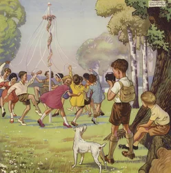 Junge filmt Kinder, die um einen Maibaum tanzen