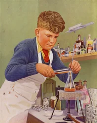 Junge führt ein Chemieexperiment durch