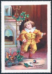 Junge spielt mit Spielzeug, Weihnachtskarte