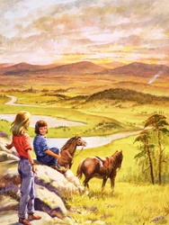 Mädchen und Ponys blicken über die Landschaft
