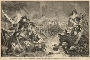 Obdachlose Bürger suchen Zuflucht vor den Flammen in den schwelenden Ruinen