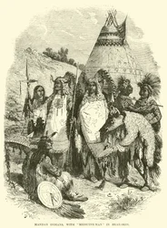 Mandan-Indianer mit Medizinmann im Bärenfell