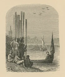 Ruderer entspannen sich am Flussufer