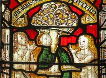 Fenster Nr. 1 zeigt die Geschichte von Adam und Eva: die Schlange verführt