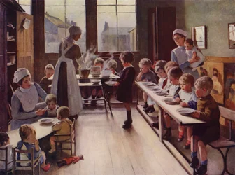 Kleine Kinder beim Essen in einer Kindertagesstätte