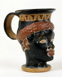 Etruskische Vase in Form des Kopfes eines Schwarzen Mannes. Museo Nazionale di Tarquinia.