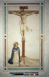 Die Kreuzigung mit dem heiligen Dominikus. Inschrift "INRI" auf dem Kreuz. Fresko von Guido di Pietro