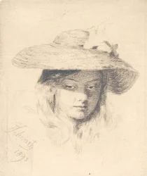 Junges Mädchen mit Strohhut