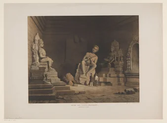 Zwei Männer in den Ruinen von Tjandi Mendoet