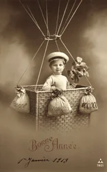 Neujahrskarte 1913, mit einem Jungen, der einen Ballon besteigt, mit viel Geld als Ballast