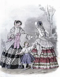 2 modische Frauen mit einem Mädchen auf einem Spaziergang - im „Journal des Demoiselles“ 1852.