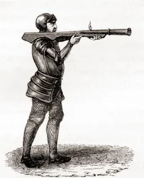 Ein Fußsoldat mit einer Handbombarde, späte 14. und 15. Jahrhunderte, nach einer Zeichnung aus dem 19. Jahrhundert, aus Les Merveilles de la Science, veröffentlicht um 1870 (Stich)