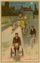 Acetylen-Scheinwerfer an einem Auto und einem Motorrad