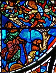 Detail eines Fensters, das das Gleichnis vom barmherzigen Samariter darstellt: Gott erscheint Moses im brennenden Busch (Detail)