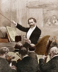Giuseppe Verdi dirigiert das Opernorchester bei der ersten Aufführung von „Aida“ in Paris im Jahr 1880