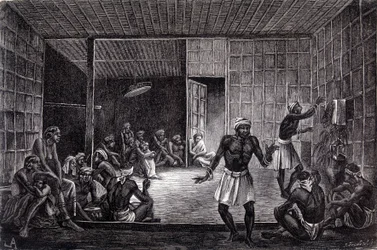 Illustration veröffentlicht in der Ausgabe von 1862 von „Le Tour du monde“, die eine Exorzismussitzung zeigt, die von den Dayaks auf der Insel Borneo praktiziert wird. Gravur