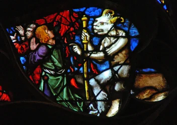 Das Westrosenfenster zeigt eine Szene aus dem Buch der Offenbarung: Lamm auf dem Berg Zion mit zwei der 144.000 Erlösten (14:1-5).