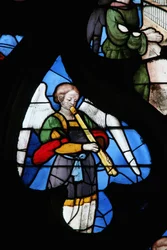 Fenster, das einen musikalischen Engel zeigt