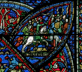 Fenster w21 zeigt eine Szene aus dem Leben des hl. Eustachius: er tritt in die Armee ein und kämpft