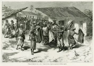 Das Dorf Bakourou, den Einheimischen werden Geschenke für Friedensverhandlungen angeboten. Gravur von G. Vuillier, zur Illustration der Geschichte Dans les ténèbres de l