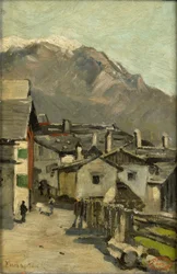 Häuser entlang einer Straße in der Nähe eines Berges (Innsbruck?)