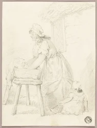 Frau beim Wäschewaschen