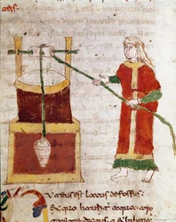 Eine Frau schöpft Wasser aus dem Brunnen. Miniatur aus dem Band „De puteis“ des Manuskripts „De Universo“ (oder De rerum naturis) von Rabanus Maurus Magnentius (ca. 780-856). 9. Jahrhundert