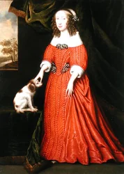 Porträt einer jungen Dame in einem roten Kleid mit einem Spaniel