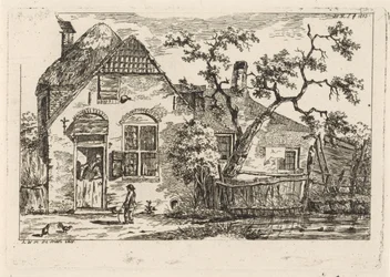 Junge mit Reifen bei einem Bauernhof