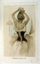 Eine Frau bereitet sich auf einen Ball vor