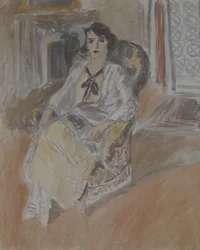 Frau, die in einem Sessel sitzt, um 1922