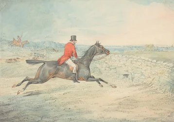 Reiter auf einem braunen Pferd, der auf eine Mauer zureitet