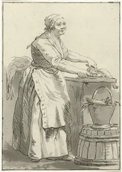Fisch putzende Frau