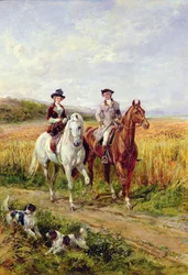 Paar reitet mit ihren Hunden