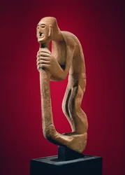 Buckliger mit einem Stab