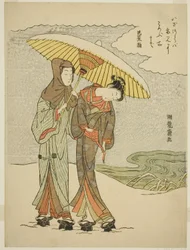 Junges Paar unter einem Regenschirm im Schnee