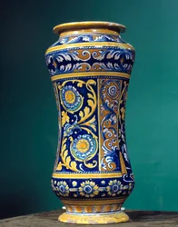Zylindrische Vase Albarello (eine Apotheke) in Majolika mit abwechselnd blauen und orange-gelben Hintergründen
