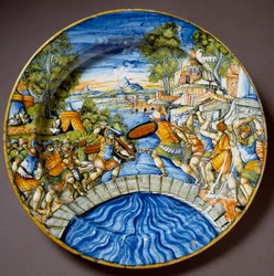 Episode aus der Verteidigung der Pons Sublicius durch den legendären römischen Helden Horatius Cocles während des Kampfes gegen die Etrusker. Keramikteller, hergestellt in Urbino in der Werkstatt Fontana, Italien. Um 1560. Florenz, Museo Nazionale del